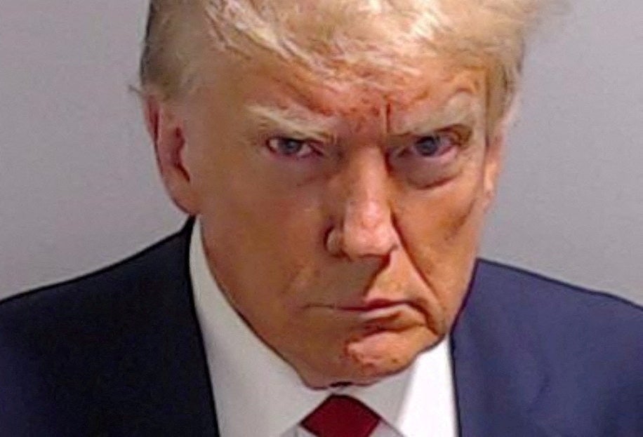 Trump’s notorious booking mugshot released by the Fulton County Sheriff's Office on August 24 2023