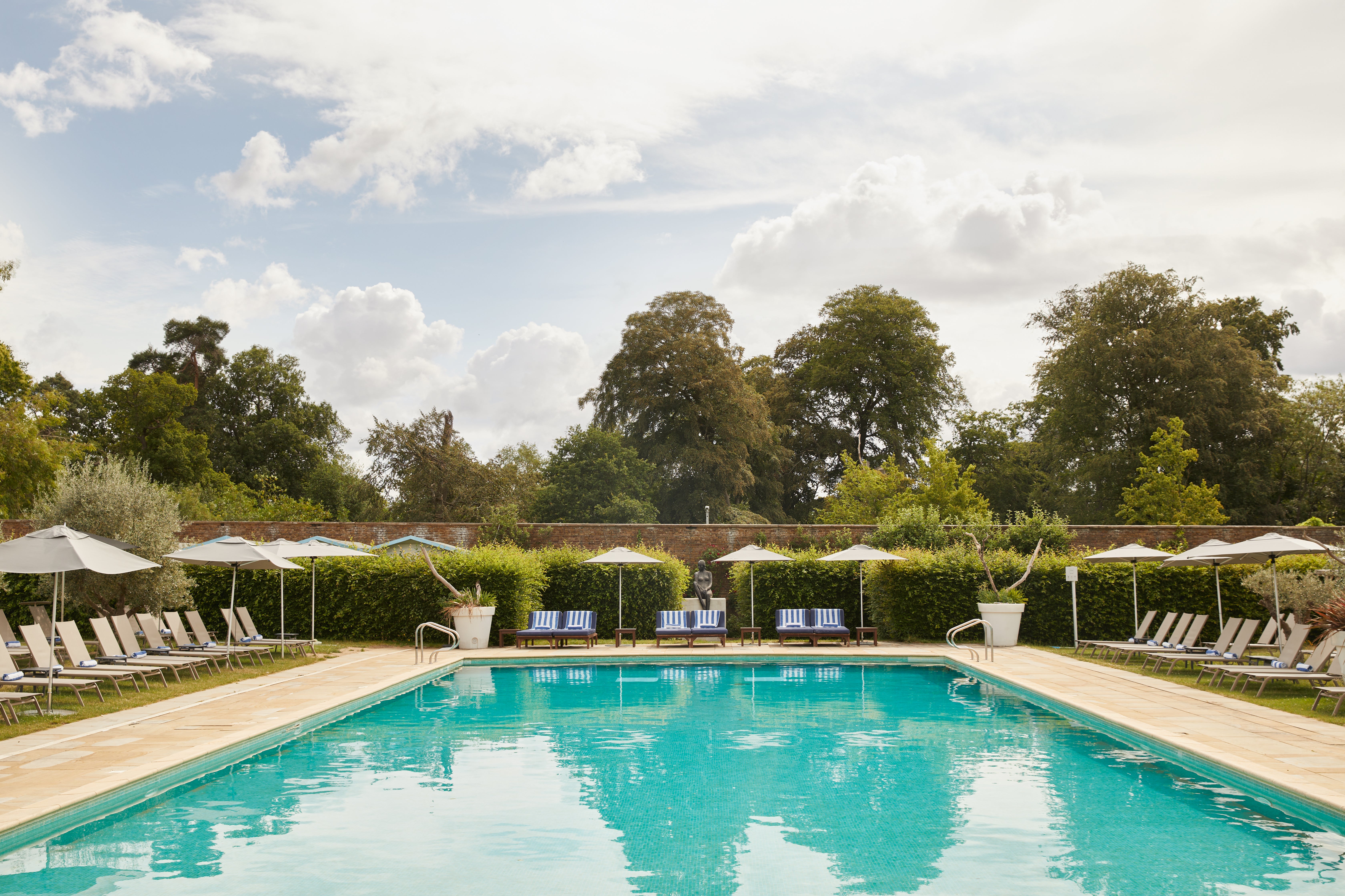 The hotel creates its own sandy beach next to the outdoor pool in summer