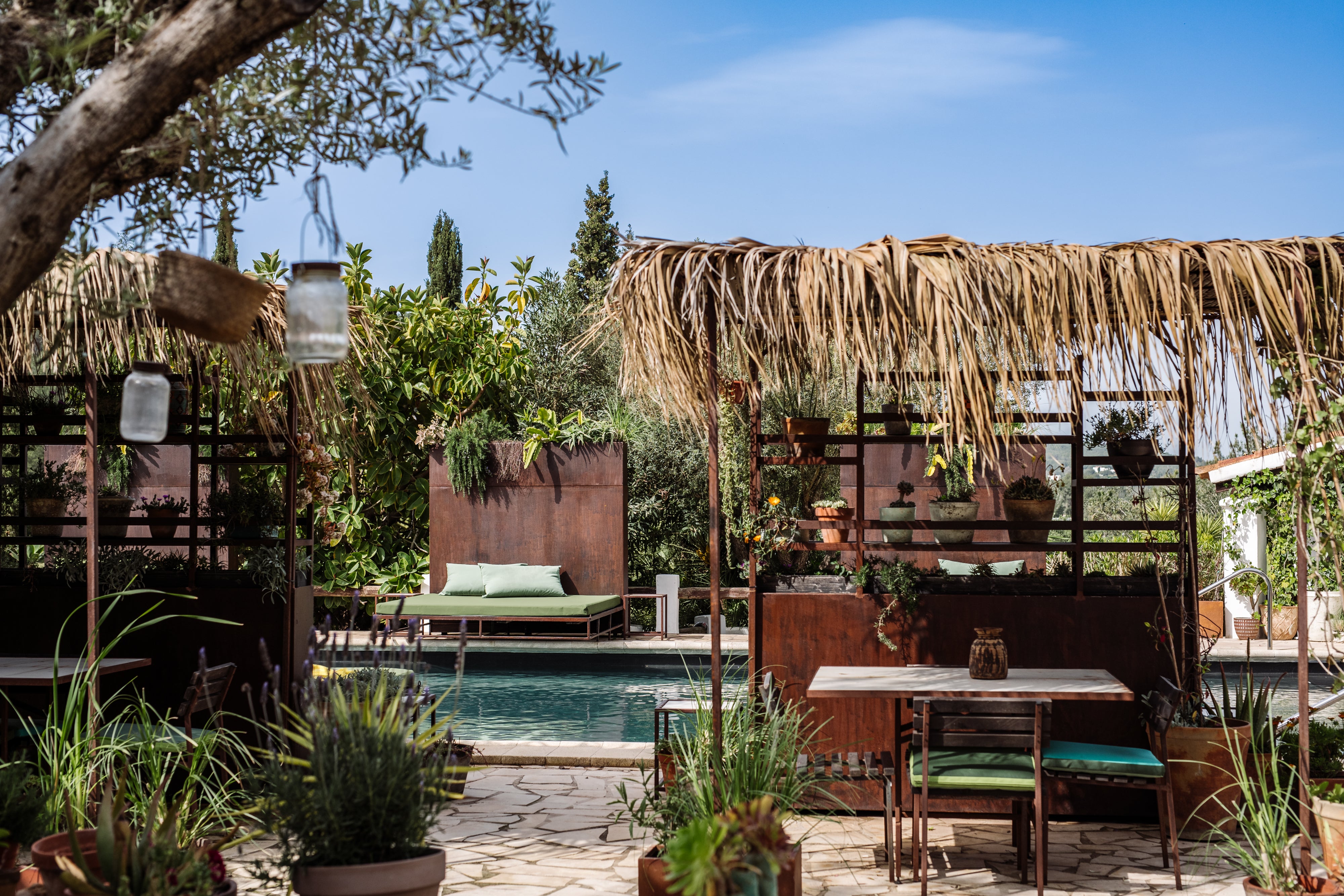 Stretch out on a sunbed next to the Legado pool