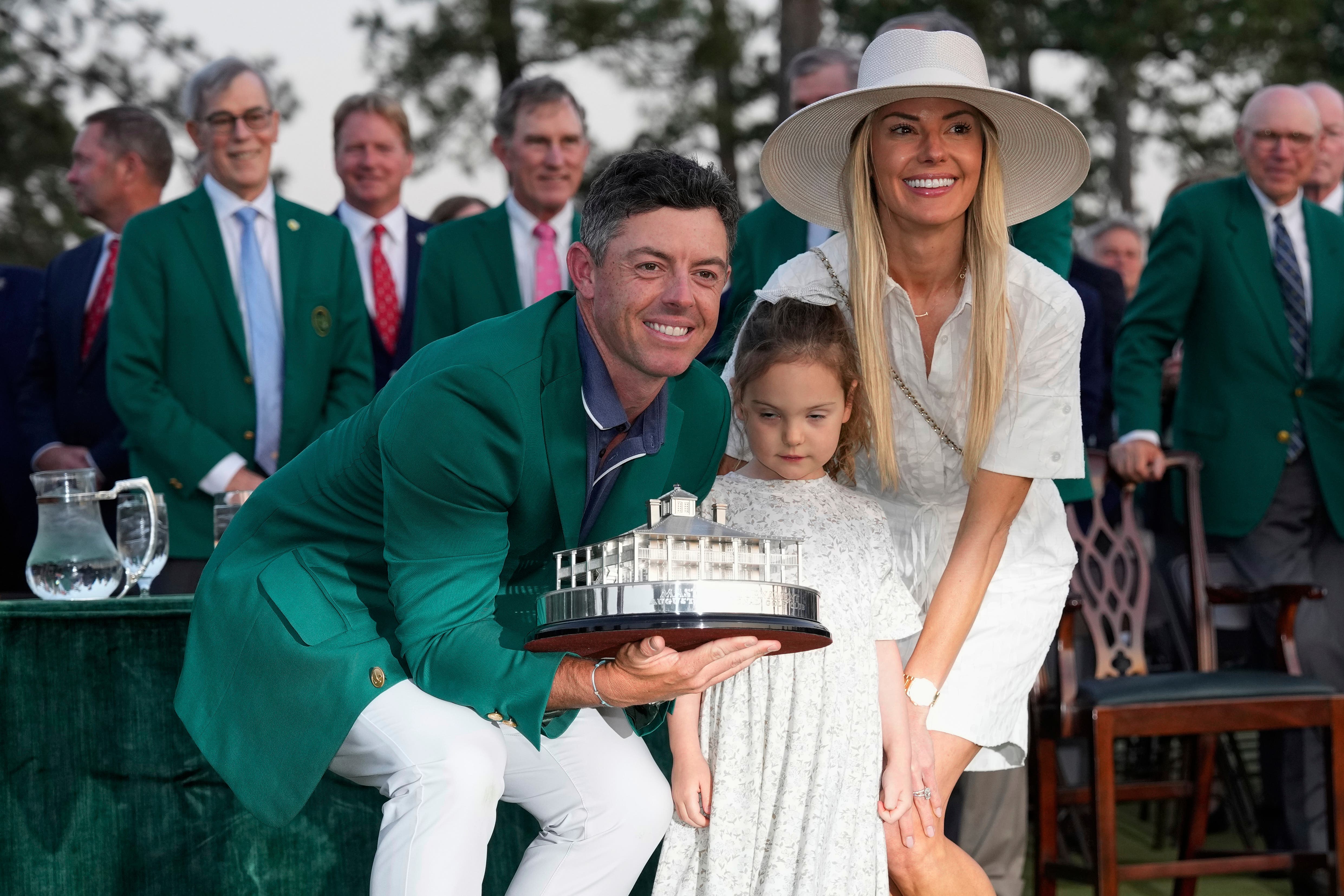 The Northern Irish golfer with his wife Erica and daughter Poppy