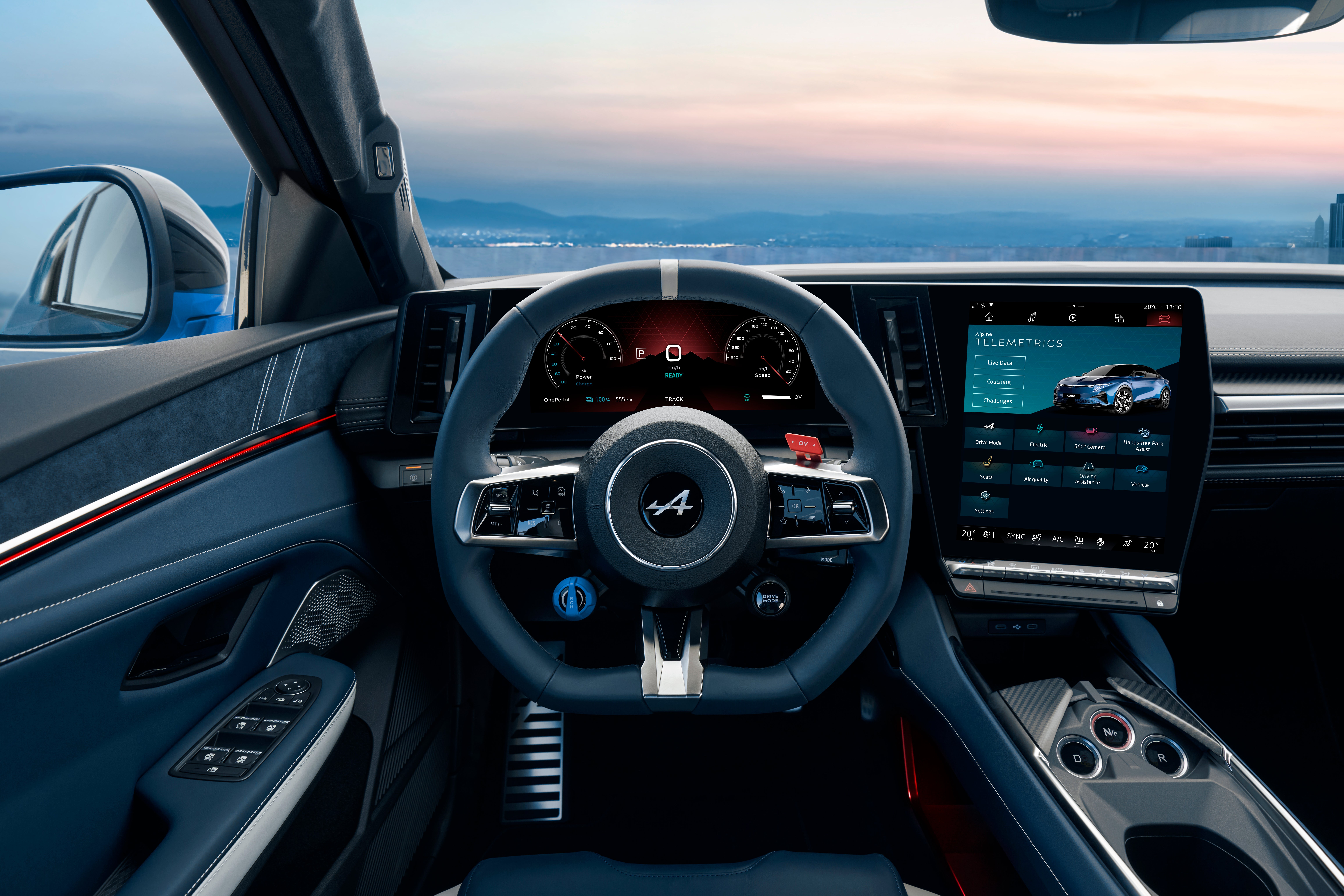 The Alpine A390 interior features an F1-inspired steering wheel